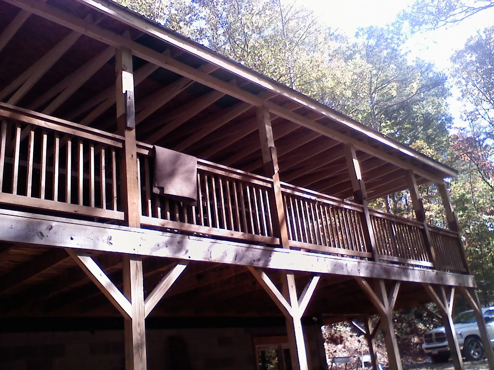 Timber framing under a new elevated porch and deck — Roof Leak Repair in Pflugerville by Roofing Brothers